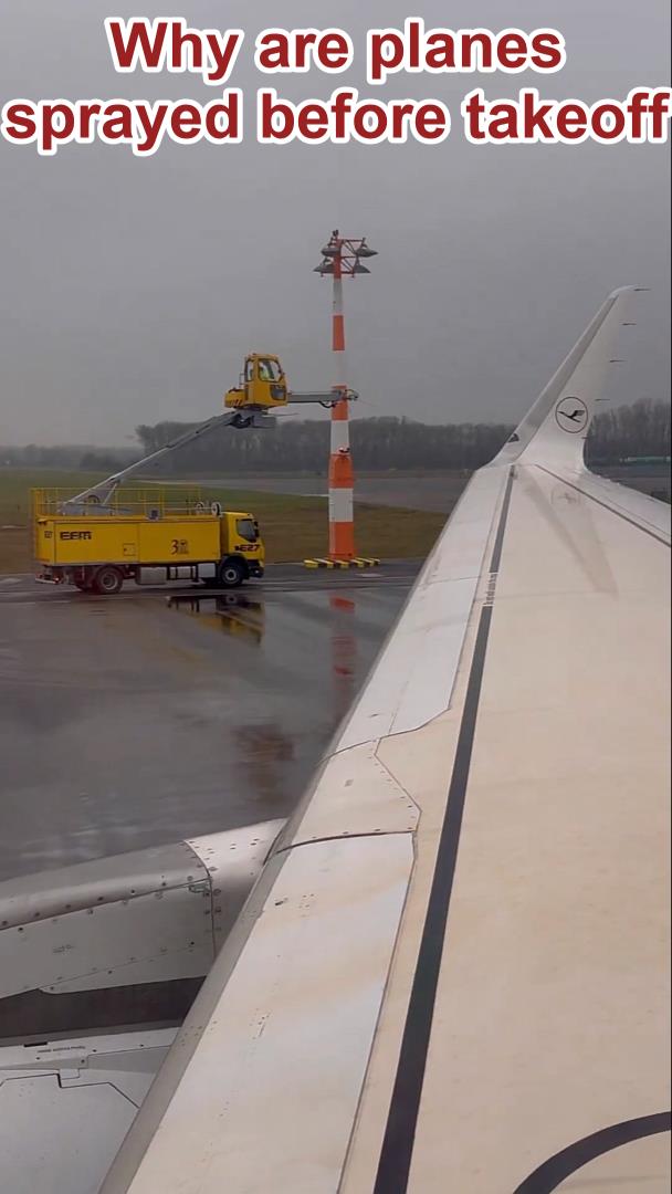 Spraying planes with a yellow material before takeoff